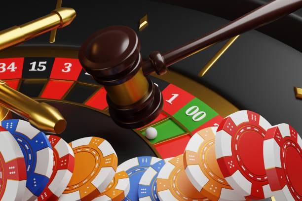 Poker chips and judges gavel over a roulette wheel 3D render